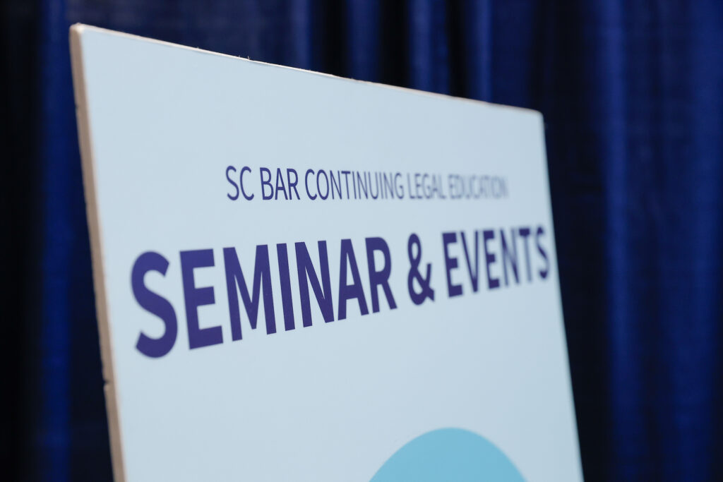 A pedestal sign displaying 'Seminar & Events' at the 50th Annual SC Bar Convention.