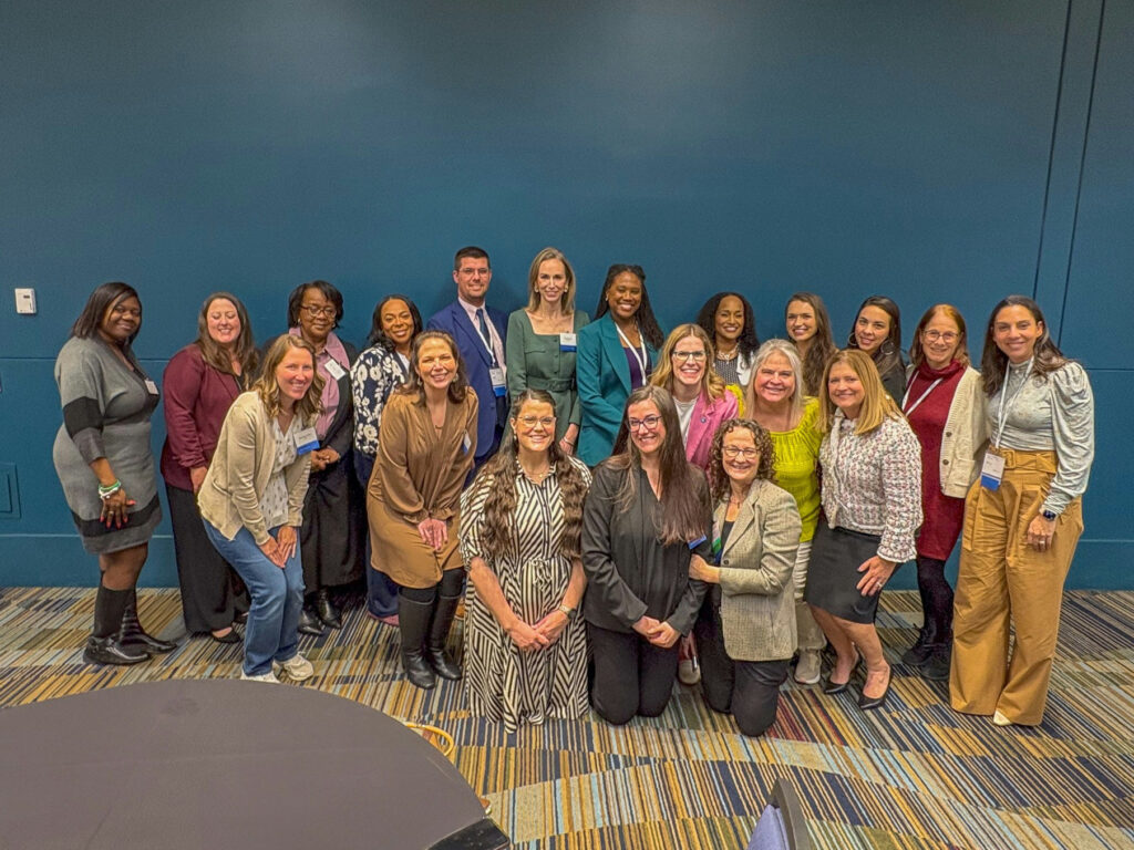 Group of attendees smiling for a photo at the 50th Annual SC Bar Convention.